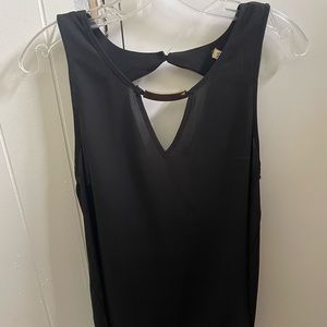Women’s black tank top with scoop back